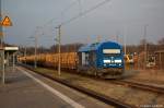 BR 223/187485/253-015-8-press-223-052-2-mit 253 015-8 PRESS (223 052-2) mit einem Holzzug in Rathenow in Richtung Stendal unterwegs. 28.03.2012